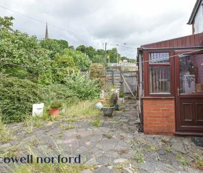 EXTENDED DETACHED 3-BEDROOM HOME WITH MASSIVE POTENTIAL
