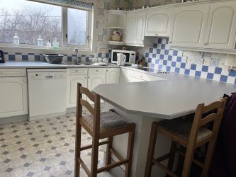 Town and Country Property Auctions proudly presents Polcraig Guest House, a modern detached property nestled in the heart of Lochinver, Scotland.