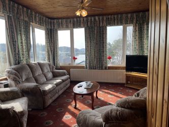 Town and Country Property Auctions proudly presents Polcraig Guest House, a modern detached property nestled in the heart of Lochinver, Scotland.