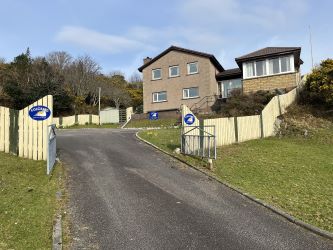 Town and Country Property Auctions proudly presents Polcraig Guest House, a modern detached property nestled in the heart of Lochinver, Scotland.