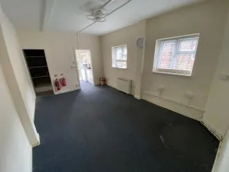 Vacant Ground Floor Shop with Rear Garden and River Views in Wimborne - Ideal Investment with Potential 10%+ Return Rental Income