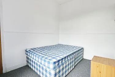 THIS INCOME GENERATING MID TERRACE PROPERTY IS