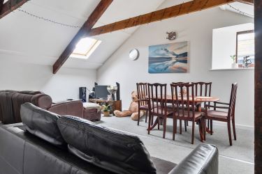 Elevate Your Portfolio: Exceptional 2nd-Floor Apartment, Featuring a Remarkable 22ft Open Plan Living Area Adorned with Exposed Beams. This Unique Property Offers Three Bedrooms, Including a Master Bedroom with a Balcony Showcasing Breathtaking Estuary Views. An Investment Opportunity Not to Be Missed for Discerning Investors Seeking Distinctive Assets.