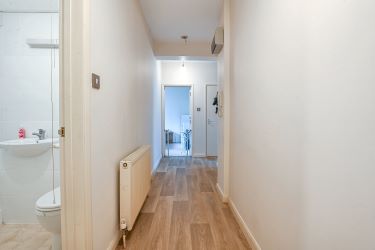 Coastal Ground Floor Flat with Strong Rental Appeal