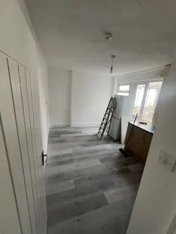Mixed - Use Building: Commercial shop use class on the ground floor, with a part converted uppers to a 3 bed residential flat. Requires physical separation with a stud wall from commercial to residential.
