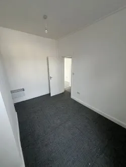 Mixed - Use Building: Commercial shop use class on the ground floor, with a part converted uppers to a 3 bed residential flat. Requires physical separation with a stud wall from commercial to residential.