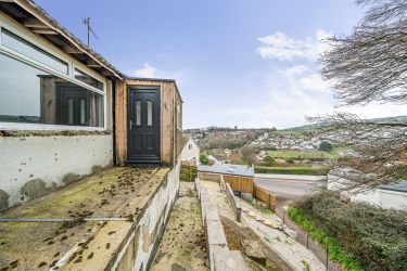 Charming Detached Bungalow with Partly Completed Self-Contained Annex and Breathtaking Views in Teignmouth