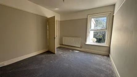 A well-maintained property comprising two self-contained apartments, offering excellent potential for rear extension to increase floor space or to add an additional unit (STP). - 7 & 7a Sedgley Road, Winton Banks, Bournemouth, Dorset, BH9 2JN