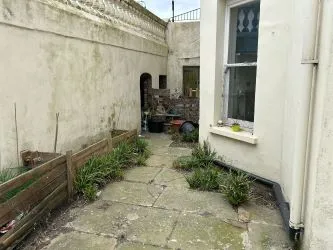 A spacious two bedroom, basement apartment set in the Regency Gardens of Warrior Square.  - Basement Flat G Warrior House, 22 Warrior Square, St Leonards-on-Sea, East Sussex, TN37 6BS