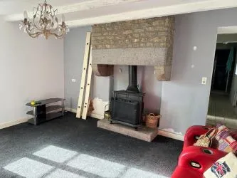 2 Bedroom stone cottage to finish renovating with outbuildings and almost 2 acres of land.
