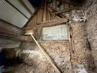 2 Bedroom stone cottage to finish renovating with outbuildings and almost 2 acres of land.