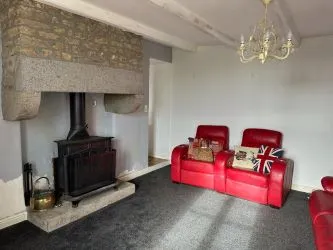 2 Bedroom stone cottage to finish renovating with outbuildings and almost 2 acres of land.