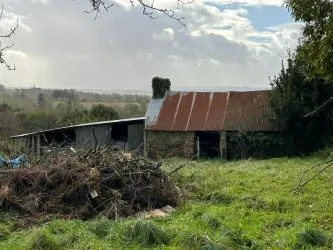 2 Bedroom stone cottage to finish renovating with outbuildings and almost 2 acres of land.