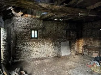 3 bedroom stone house with outbuilding and garden in a small hamlet.