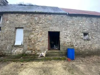 Stone Farmhouse to renovate with over 5 acres including woodland in Normandy in rural hamlet