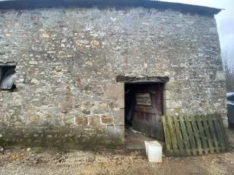 Stone Farmhouse to renovate with over 5 acres including woodland in Normandy in rural hamlet
