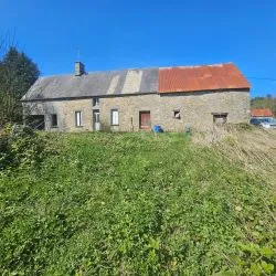 Stone Farmhouse to renovate with over 5 acres including woodland in Normandy in rural hamlet