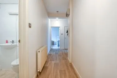 Coastal Ground Floor Flat with Strong Rental Appeal