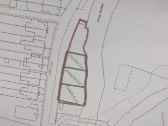 A rare and exciting opportunity to acquire a parcel of picturesque riverside land nestled alongside the tranquil River Nadder and overlooking Harnham Water Meadows. - Riverside Land Opposite, 45-49 Lower Road, Salisbury, Wiltshire, SP2 9NF