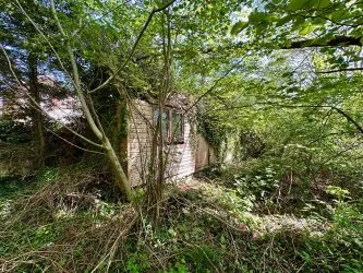A rare and exciting opportunity to acquire a parcel of picturesque riverside land nestled alongside the tranquil River Nadder and overlooking Harnham Water Meadows. - Riverside Land Opposite, 45-49 Lower Road, Salisbury, Wiltshire, SP2 9NF