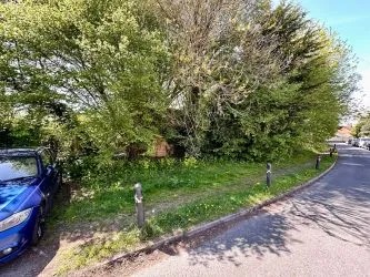 A rare and exciting opportunity to acquire a parcel of picturesque riverside land nestled alongside the tranquil River Nadder and overlooking Harnham Water Meadows. - Riverside Land Opposite, 45-49 Lower Road, Salisbury, Wiltshire, SP2 9NF