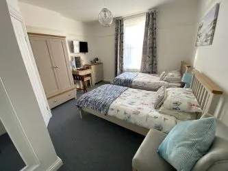 Exceptional Investment Opportunity – six-bedroom with three-bedroom managers flat - A prime Lifestyle Business or HMO Development Potential -South Rising, 86 Parkstone Road, Poole, Dorset, BH15 2QE