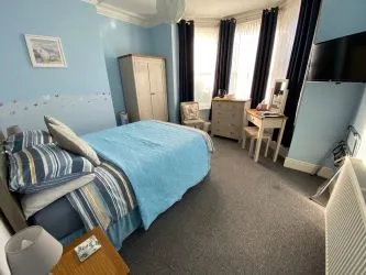 Exceptional Investment Opportunity – six-bedroom with three-bedroom managers flat - A prime Lifestyle Business or HMO Development Potential -South Rising, 86 Parkstone Road, Poole, Dorset, BH15 2QE