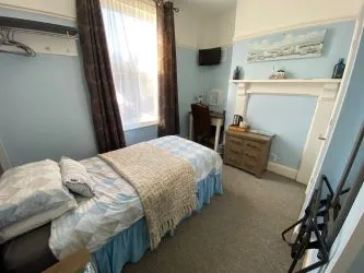 Exceptional Investment Opportunity – six-bedroom with three-bedroom managers flat - A prime Lifestyle Business or HMO Development Potential -South Rising, 86 Parkstone Road, Poole, Dorset, BH15 2QE