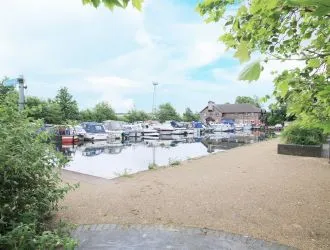 Set in a sought-after location, Flat 4, 79 Marland Way, Stretford, Manchester, M32 0NQ offers a fantastic investment opportunity with strong rental potential. This well-positioned riverside apartment enjoys stunning views over the marina, providing an attractive setting for tenants seeking a peaceful yet well-connected home. The property is being sold with vacant possession, allowing for immediate occupancy or the flexibility to secure new tenants at market value. Stretford’s ongoing regeneration and proximity to Manchester city centre make this a compelling prospect for investors looking to capitalise on rising demand in the area.