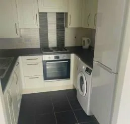 TWO BEDROOM TOP FLOOR APARTMENT