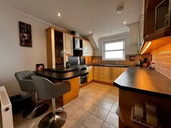 Town and Country Property Auctions are pleased to present this stylish, fully furnished top-floor flat, offering stunning views of the coast and the Dornoch hills.