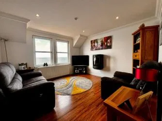 Town and Country Property Auctions are pleased to present this stylish, fully furnished top-floor flat, offering stunning views of the coast and the Dornoch hills.