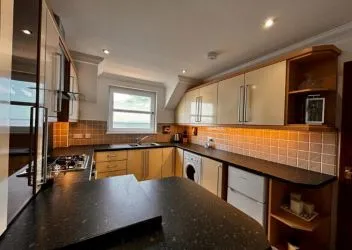 Town and Country Property Auctions are pleased to present this stylish, fully furnished top-floor flat, offering stunning views of the coast and the Dornoch hills.