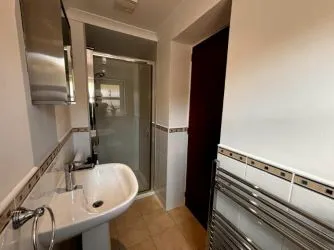 Town and Country Property Auctions are pleased to present this stylish, fully furnished top-floor flat, offering stunning views of the coast and the Dornoch hills.