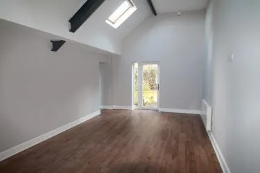 A Former Memorial Hall, Having Been Converted Into Three Self Contained Apartments, Being Situated In A Beautiful Part Of North Wales And Having Excellent Road Links To The A55 Expressway. A Superb Investment Opportunity.