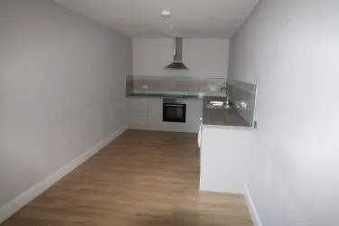 A Former Memorial Hall, Having Been Converted Into Three Self Contained Apartments, Being Situated In A Beautiful Part Of North Wales And Having Excellent Road Links To The A55 Expressway. A Superb Investment Opportunity.