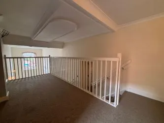 Offered to the market via auction is this unique and spacious loft-style duplex apartment, set within the impressive Grade II listed Tean Hall Mills development. Converted in 2013 to a high standard, the property is situated in the former Warehouse building and retains many original features including exposed beams, cast iron pillars, and vaulted ceilings.