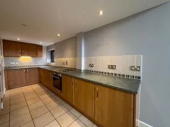 Offered to the market via auction is this unique and spacious loft-style duplex apartment, set within the impressive Grade II listed Tean Hall Mills development. Converted in 2013 to a high standard, the property is situated in the former Warehouse building and retains many original features including exposed beams, cast iron pillars, and vaulted ceilings.