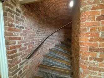 Offered to the market via auction is this unique and spacious loft-style duplex apartment, set within the impressive Grade II listed Tean Hall Mills development. Converted in 2013 to a high standard, the property is situated in the former Warehouse building and retains many original features including exposed beams, cast iron pillars, and vaulted ceilings.