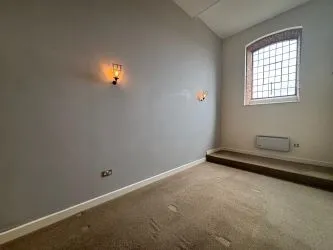 Offered to the market via auction is this unique and spacious loft-style duplex apartment, set within the impressive Grade II listed Tean Hall Mills development. Converted in 2013 to a high standard, the property is situated in the former Warehouse building and retains many original features including exposed beams, cast iron pillars, and vaulted ceilings.