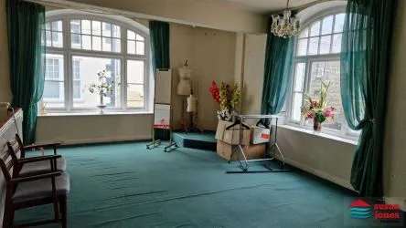 Mixed use premises set over 4 floors comprising of ground and first floor sales, basement, staff area, storage areas and a 2 bedroomed flat on the third floor, in all extending to 2,462 sq. ft. or thereabouts