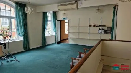 Mixed use premises set over 4 floors comprising of ground and first floor sales, basement, staff area, storage areas and a 2 bedroomed flat on the third floor, in all extending to 2,462 sq. ft. or thereabouts