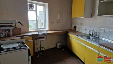 Mixed use premises set over 4 floors comprising of ground and first floor sales, basement, staff area, storage areas and a 2 bedroomed flat on the third floor, in all extending to 2,462 sq. ft. or thereabouts