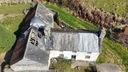 A farm house set in 9.56 acres with an extensive range of barns providing great potential for development.
