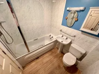 One Double Bedroom Flat with Under Ground Parking & Long Lease - Vacant Possession
