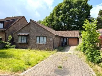 Spacious three-bedroom bungalow in a prime location near Throop Village, offering superb potential. - 28 Throopside Avenue, Bournemouth, Dorset, BH9 3NR