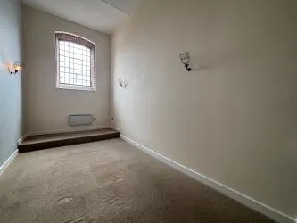 Offered to the market via auction is this unique and spacious loft-style duplex apartment, set within the impressive Grade II listed Tean Hall Mills development. Converted in 2013 to a high standard, the property is situated in the former Warehouse building and retains many original features including exposed beams, cast iron pillars, and vaulted ceilings.
