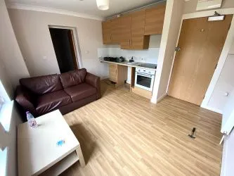 Block of Four Flats with Parking and Large Garage & Garden - Vacant Possession