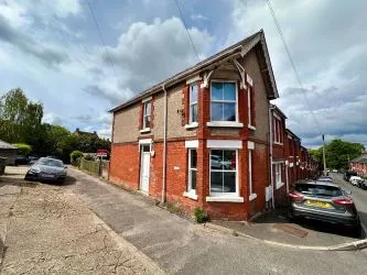 Block of Four Flats with Parking and Large Garage & Garden - Vacant Possession
