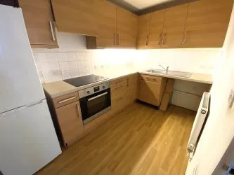 Block of Four Flats with Parking and Large Garage & Garden - Vacant Possession